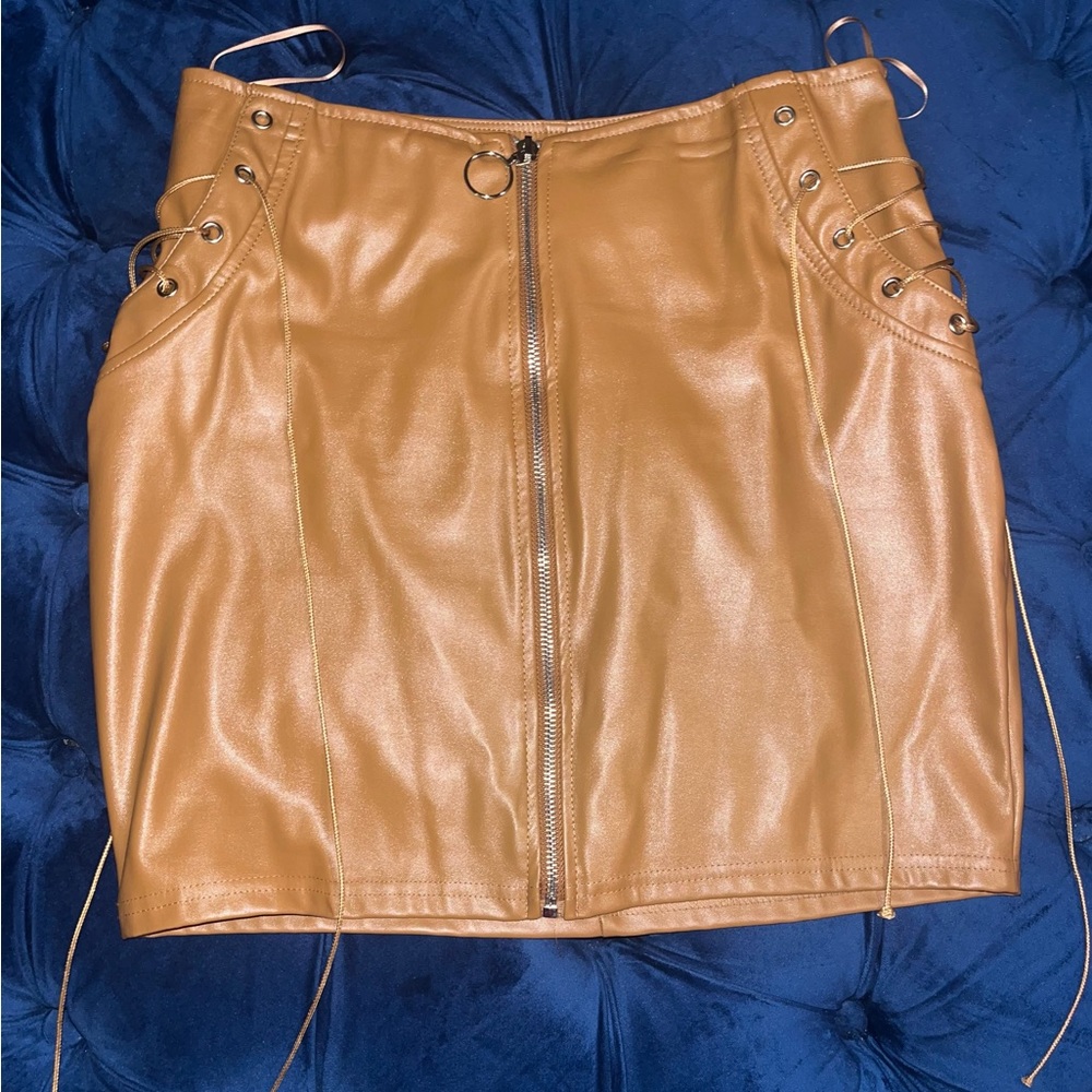 Brown leather skirt from Fashionova. Worn once. Size Medium. True to size.